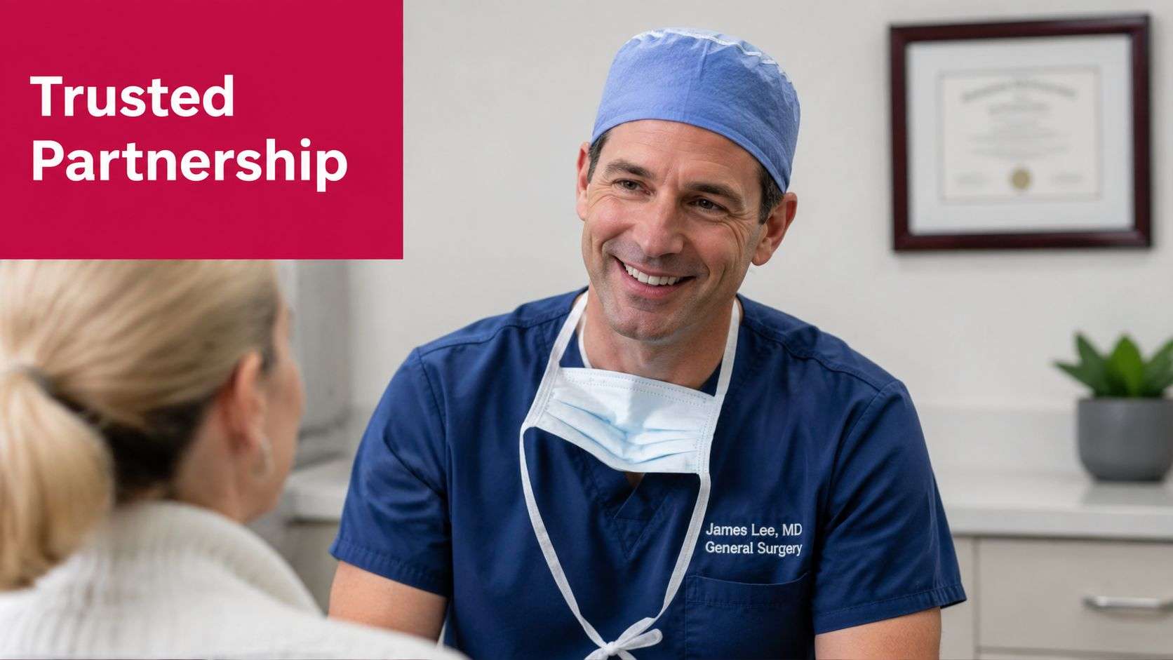 A friendly surgeon in blue scrubs having a professional consultation with a patient in an office.